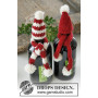 North Pole Pals by DROPS Design - świąteczna ozdoba, czapka i szalik dla butelki Zestaw do dziergania